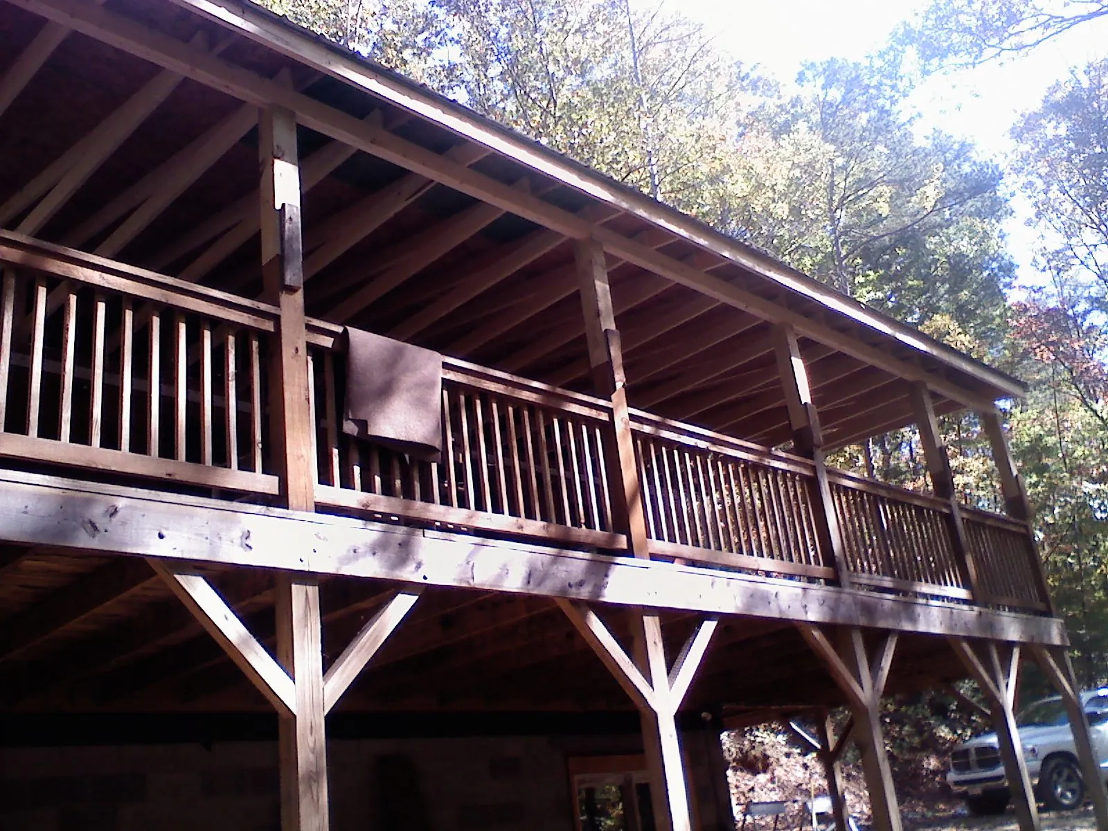 Timber framing under a new elevated porch and deck — Roof Leak Repair in Lindsay by Roofing Brothers